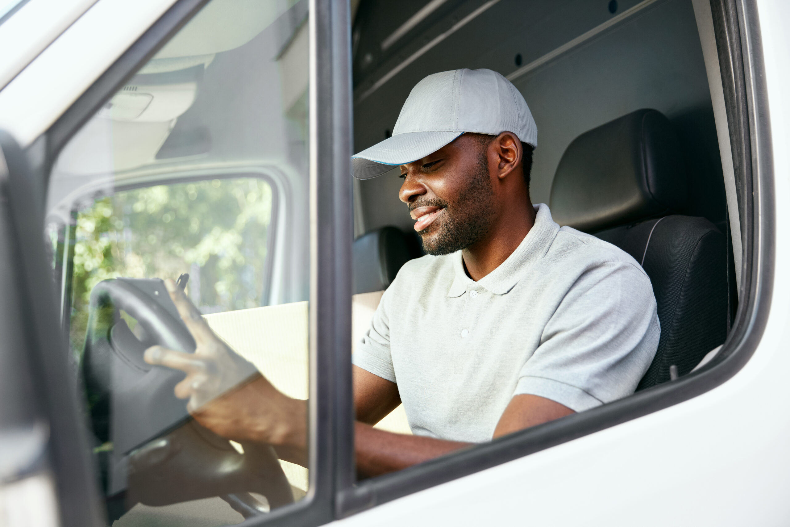 black-truck-driver-behind-the-wheel