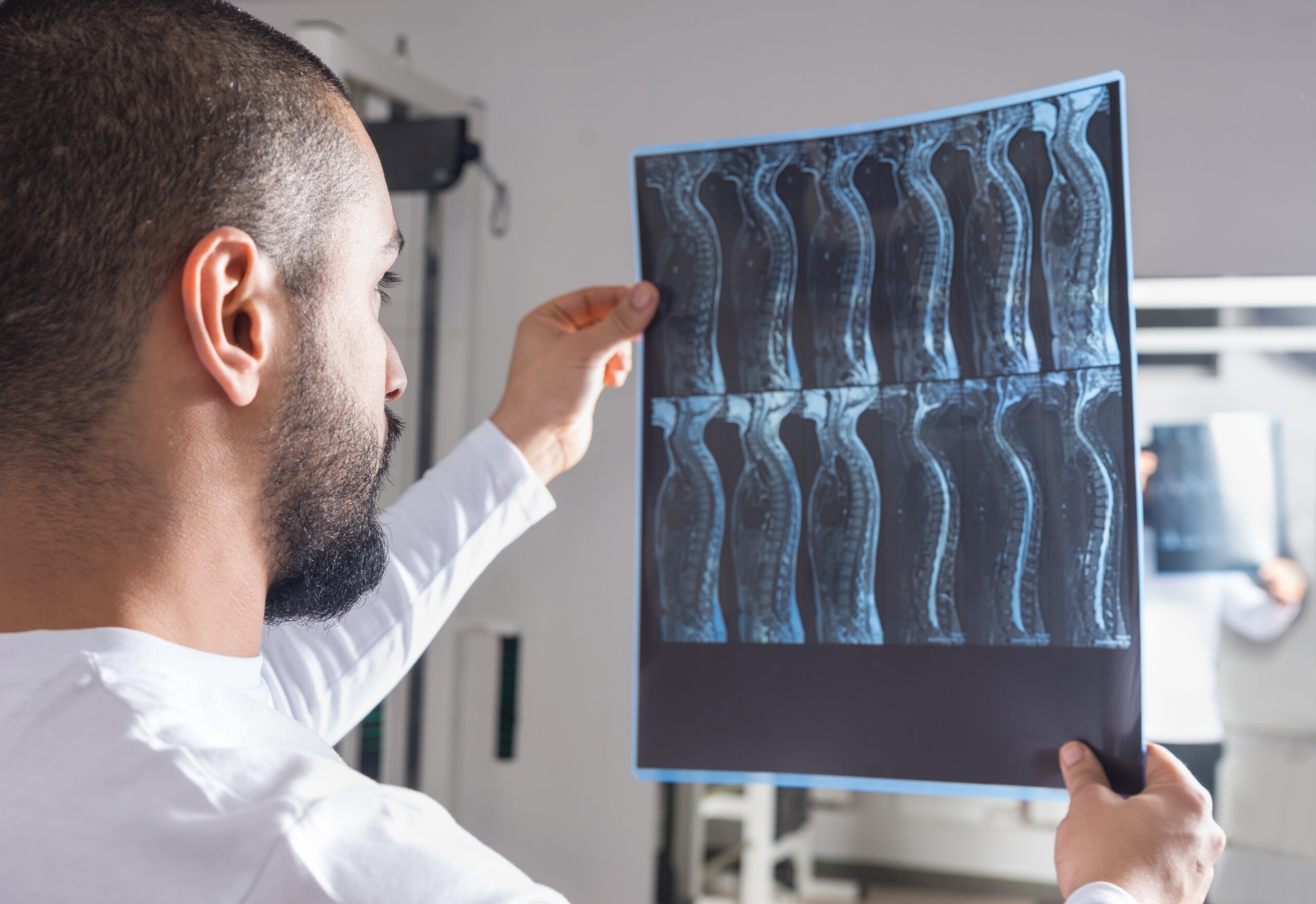 radiologist-looking-at-spinal-x-rays