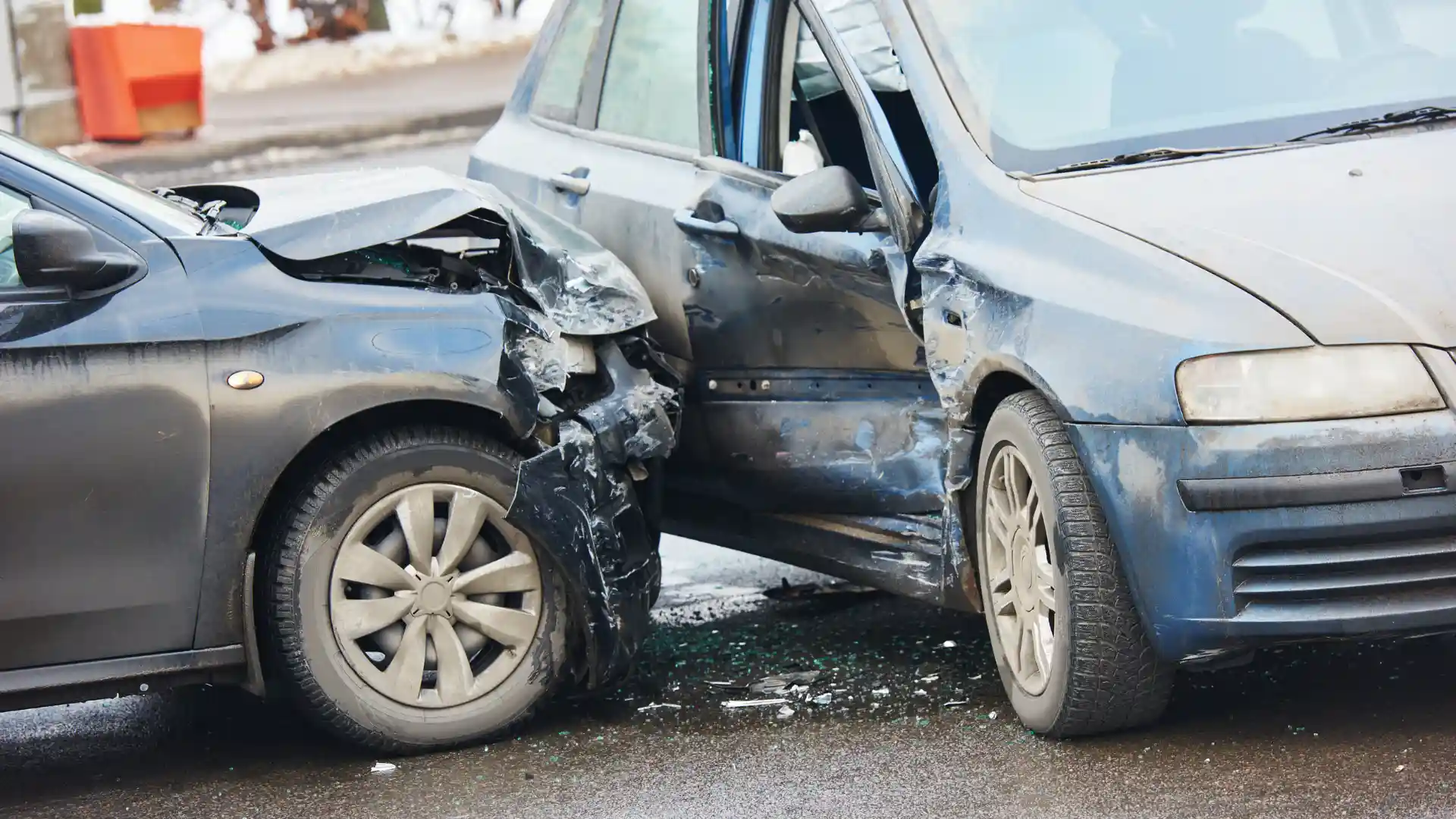 A damaged car from an accident, highlighting the aftermath of a collision with a distracted driver