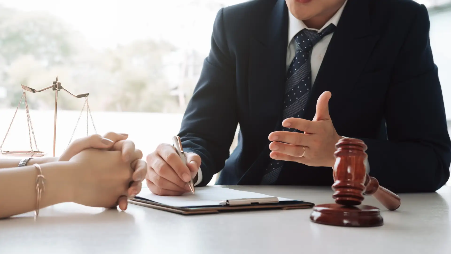 Lawyer consulting a client, discussing legal matters.