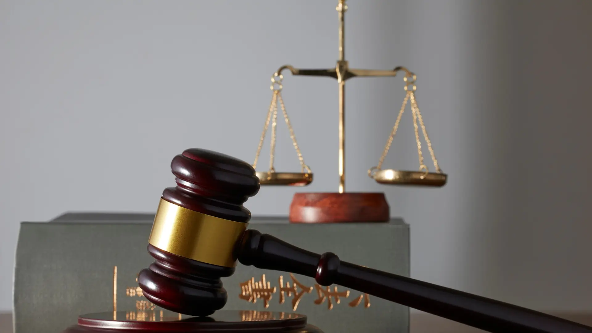 Gavel and scales of justice on a table